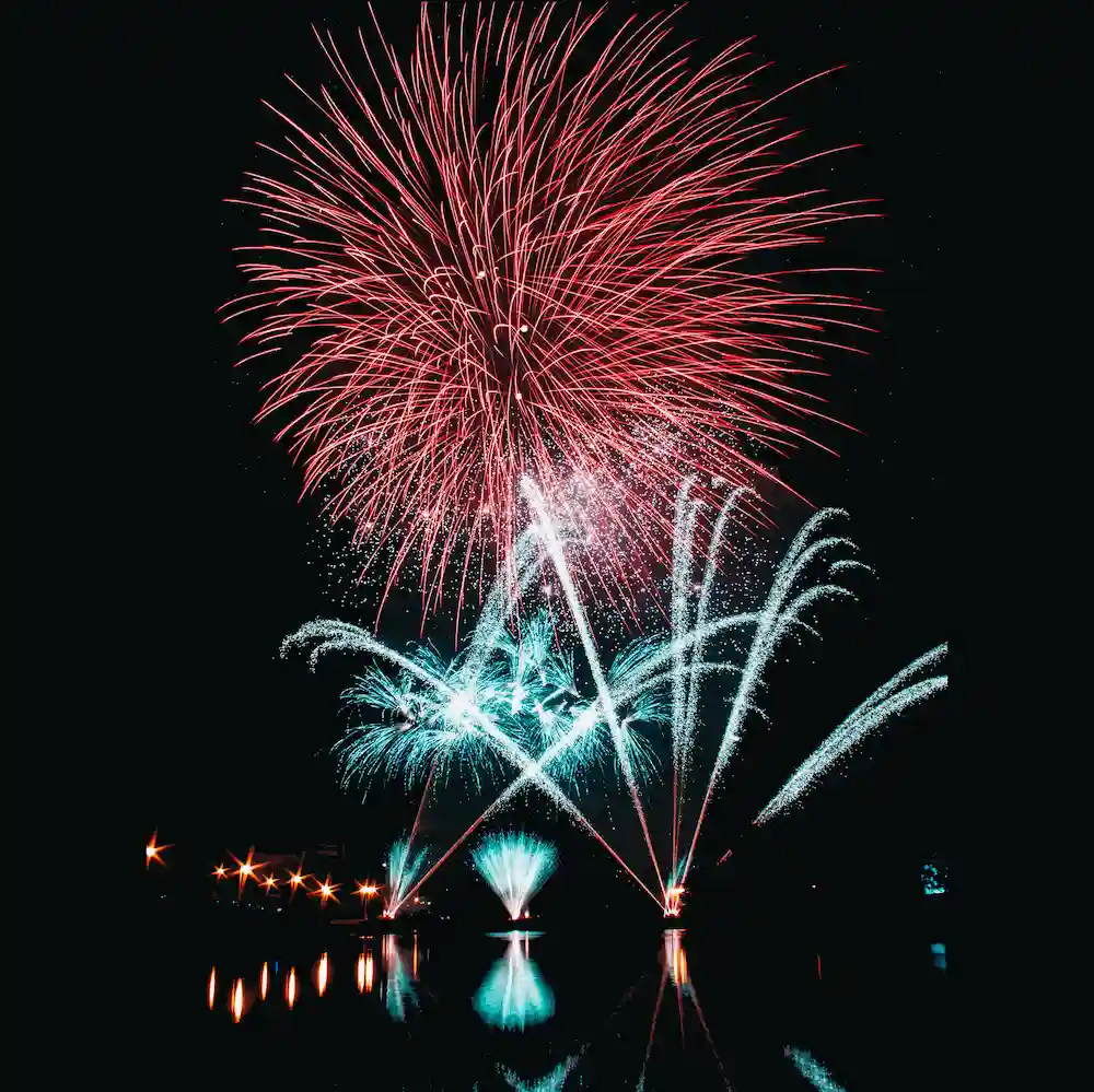 Fireworks on lake at night