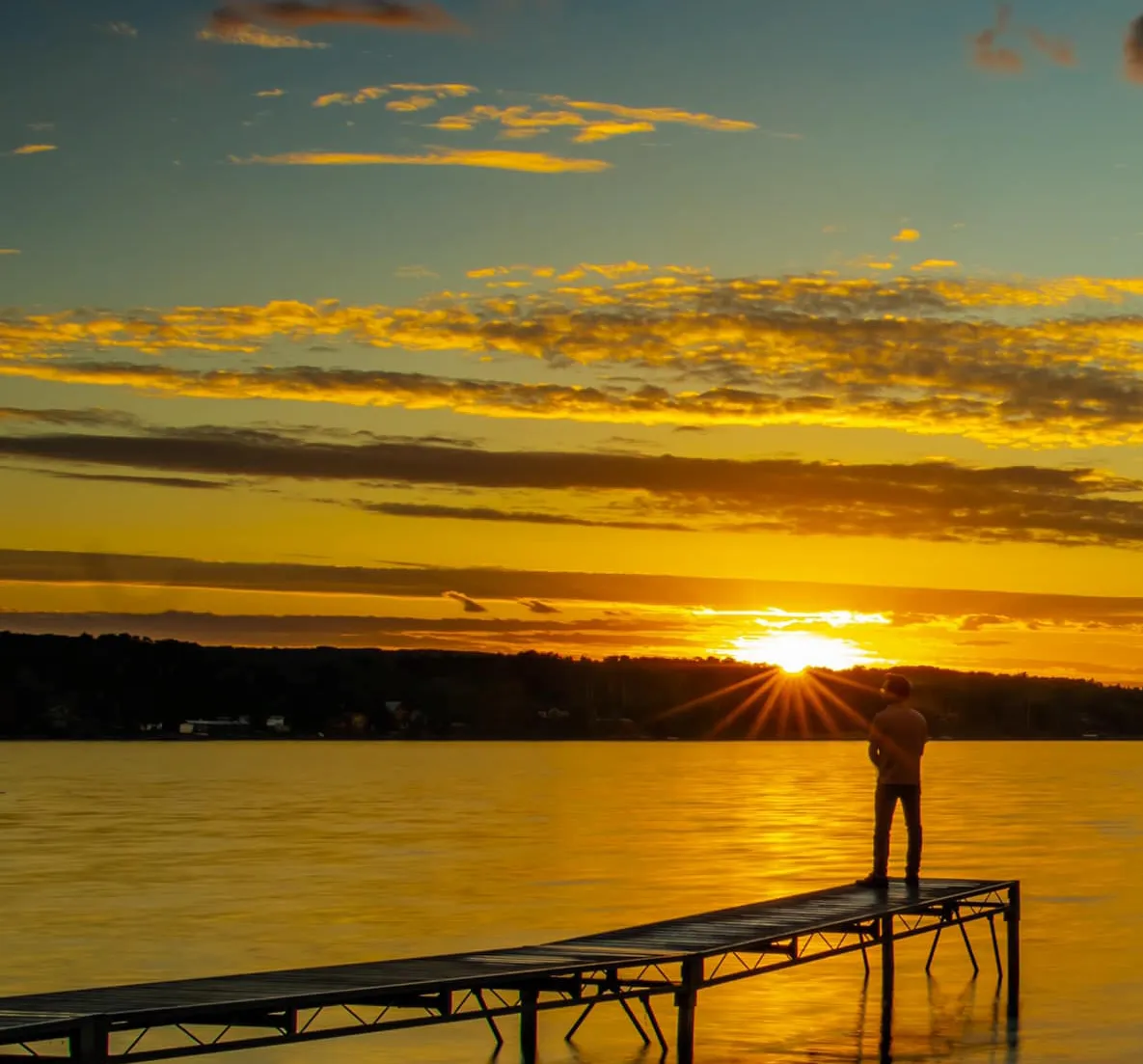 Sunset with person on dock